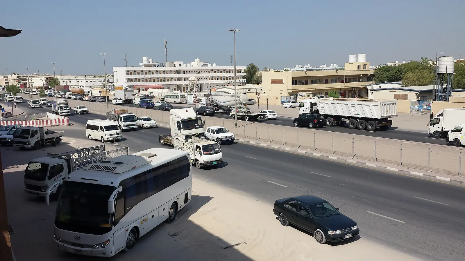 Traffic on the main road through Al Quoz Industrial Area 4 in Dubai
